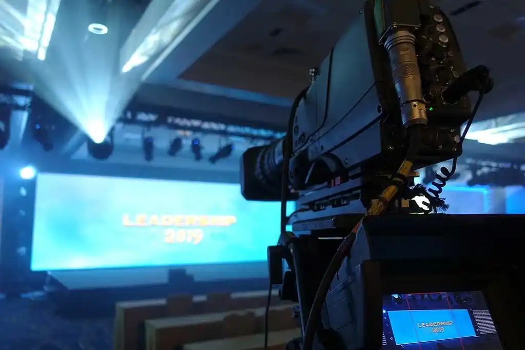 Event venue washed in warm colored uplighting