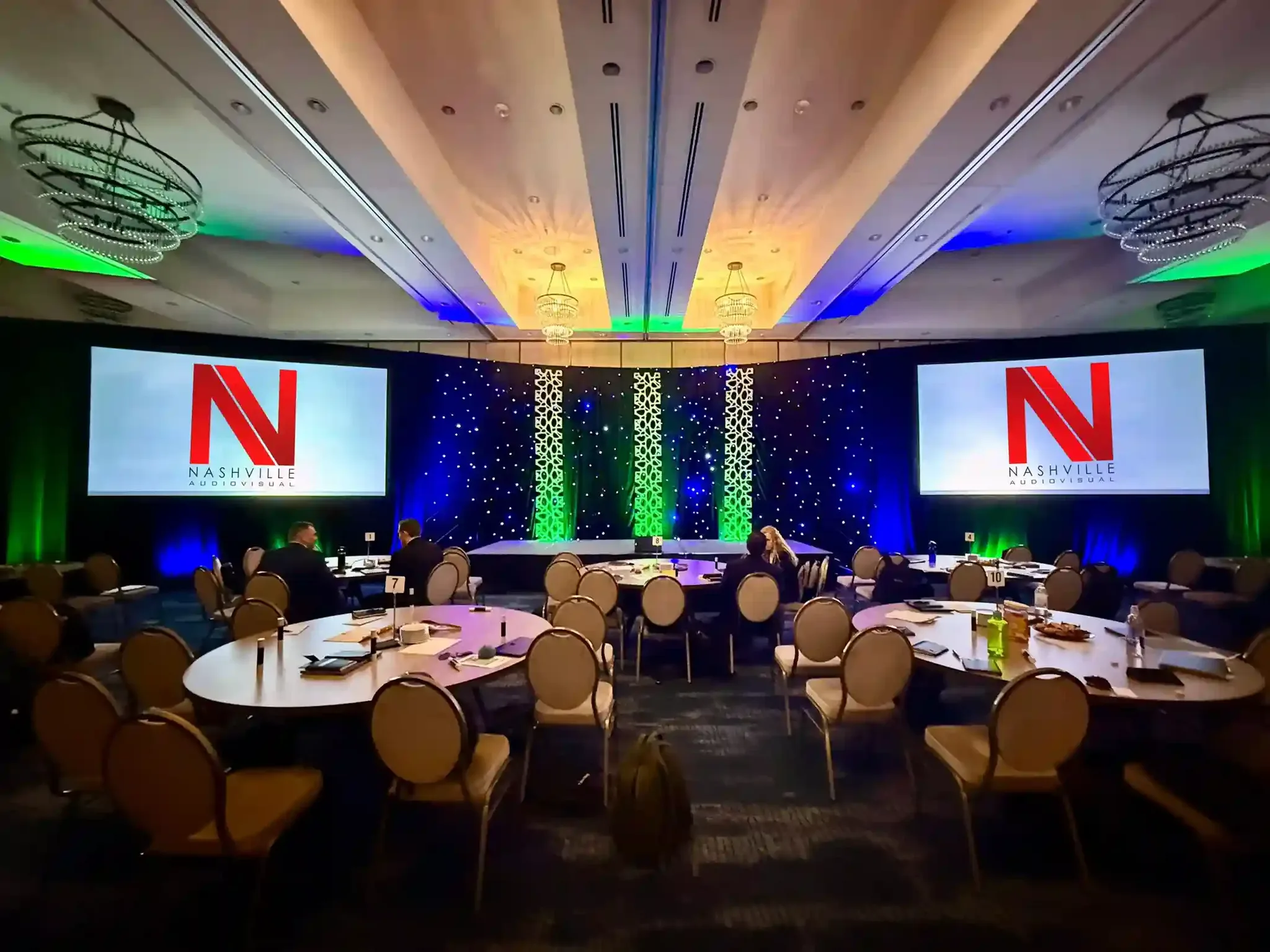 Professional event lighting crew setting up in Nashville